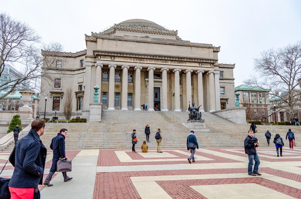 The Library of Columbia University with Students walking in forefront, New York City