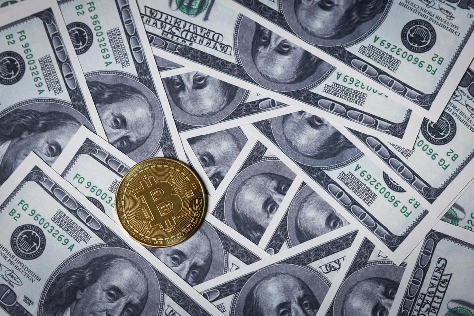 In this photo illustration, the new Bitcoin token is...