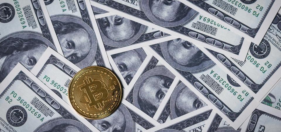 In this photo illustration, the new Bitcoin token is...