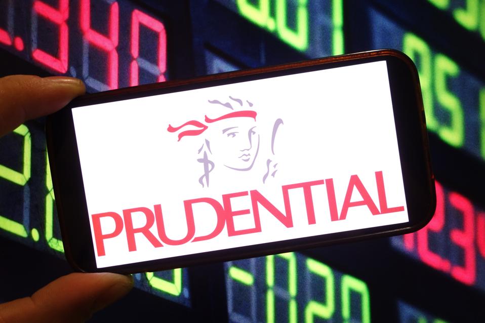 In this photo illustration, the Prudential plc company logo...