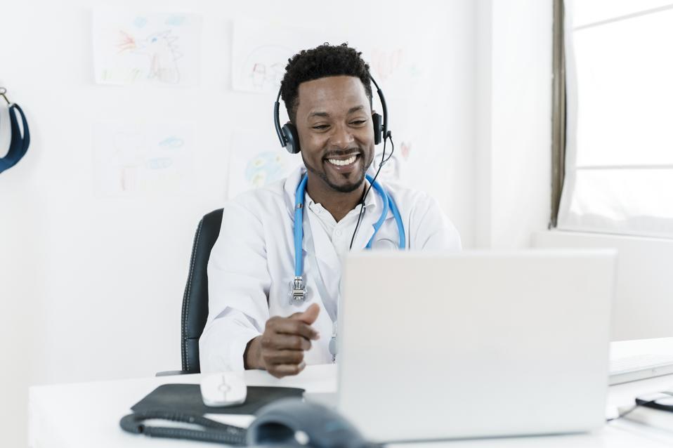 Healthcare professional working remotely during a virtual consultation