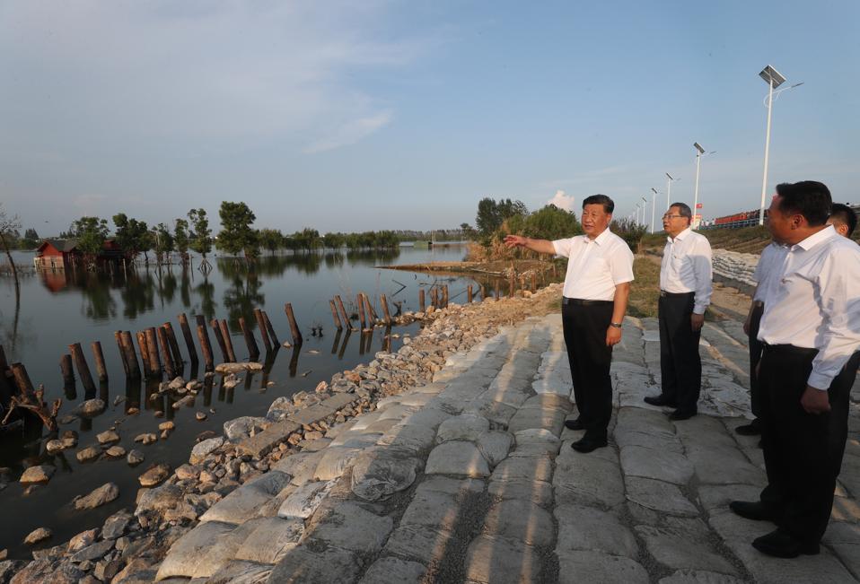 Xi Jinping inspects a dam