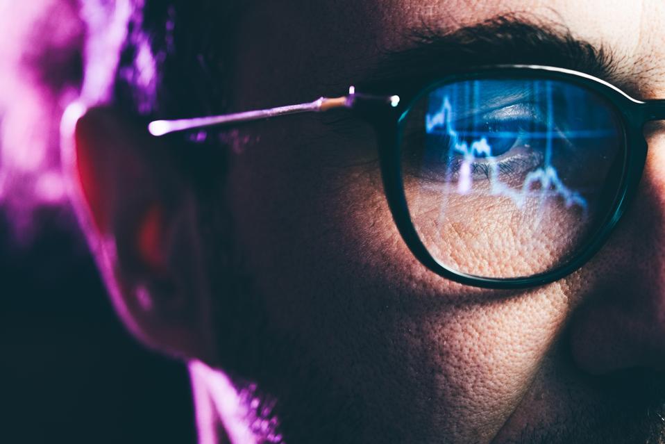 Stock charts in glasses for the topic of the best performing stocks so far in 2025.