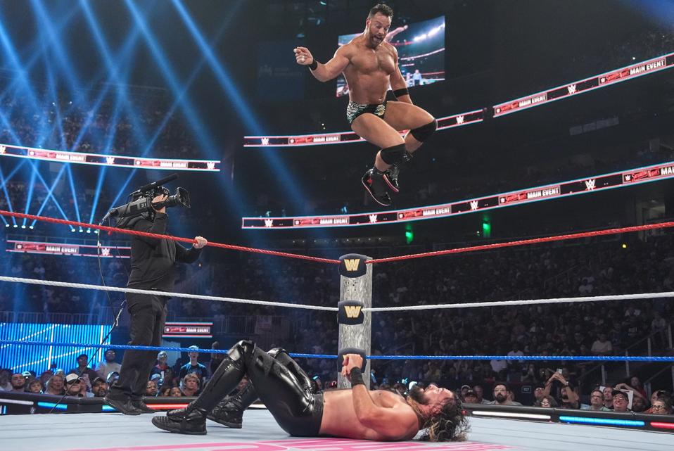 LA Knight leaps off the top rope