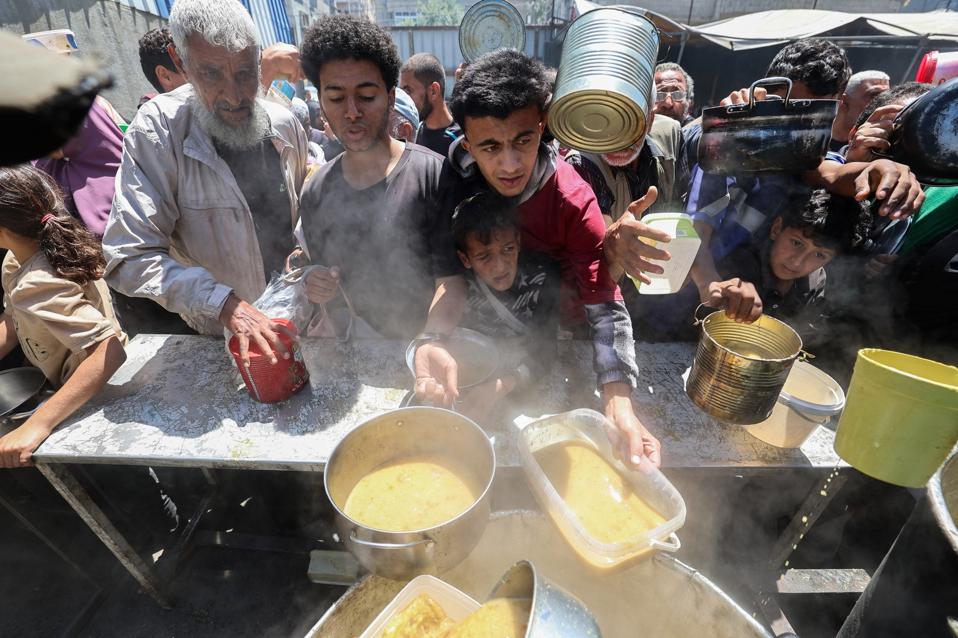 TOPSHOT-PALESTINIAN-ISRAEL-CONFLICT-HUNGER