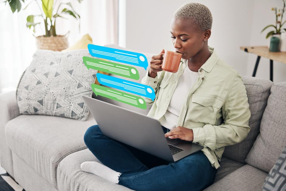 Confident entrepreneur woman, working from home using ChatGPT, with an orange mug