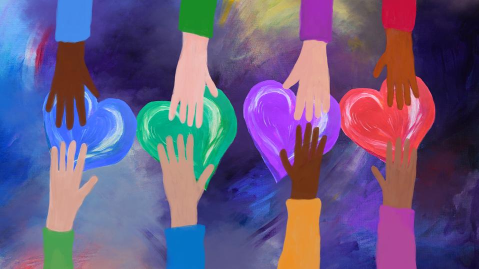 Hands giving and receiving colorful hearts. concept of love and care.