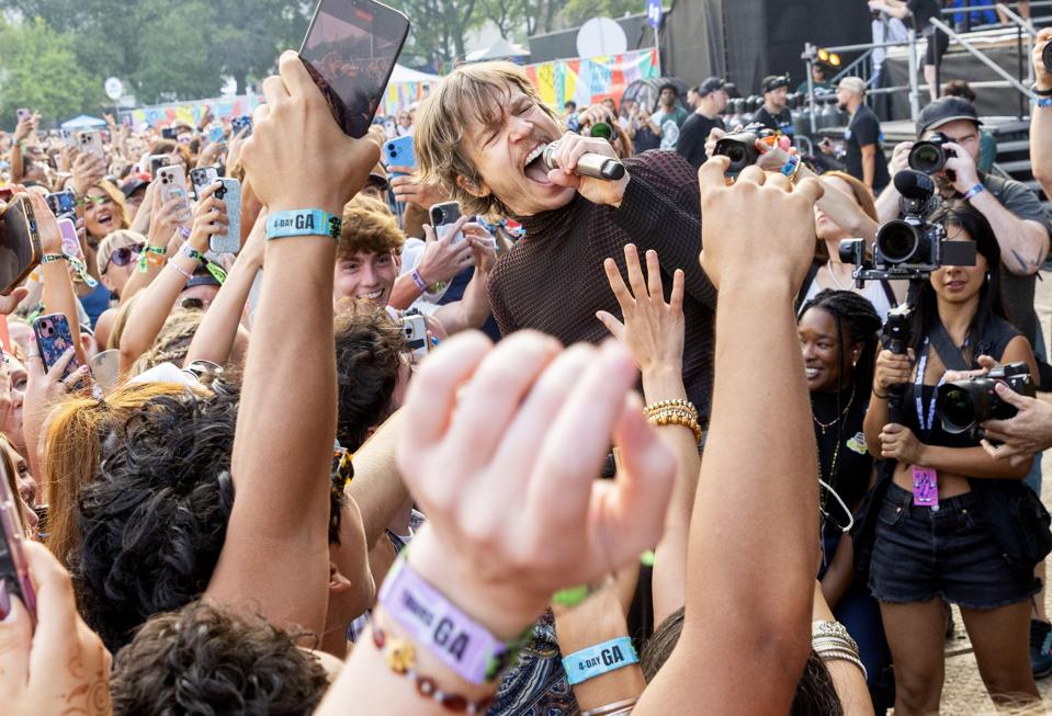 Matt Shultz of Cage the Elephant mixes it up with fans as Lollapalooza gets underway in Chicago, IL. Thursday, July 31, 2025 in Grant Park (Photo by Barry Brecheisen)