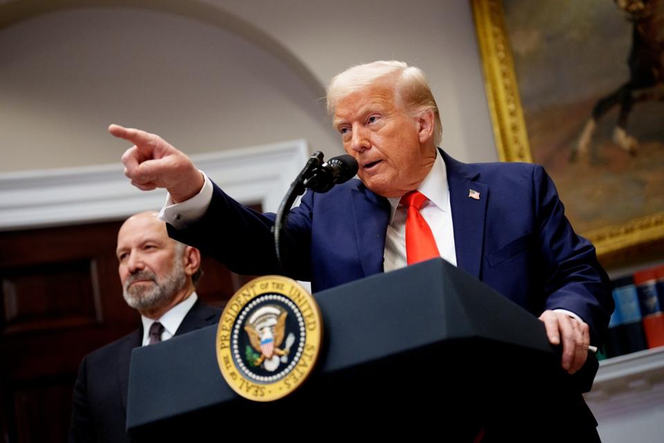 U.S. President Donald Trump takes a question from a reporter in the Roosevelt Room of the White House