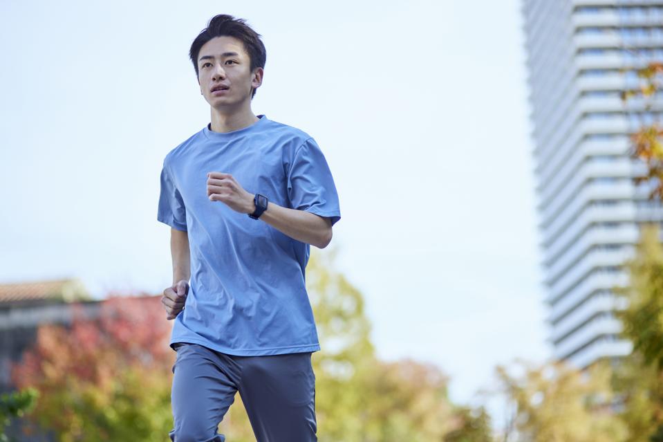 Young Japanese man wearing sportswear