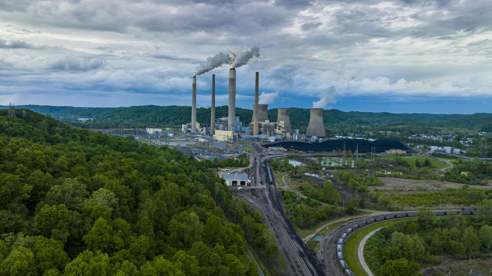 Aerial view of Jon Amos Power plant shows smoke stacks and cooling, Coal, Poca, West Virginia