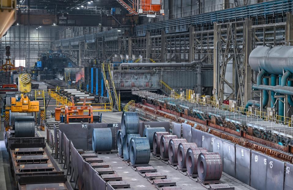 Interior of steel mill—AI and clean power enable industrial decarbonisation