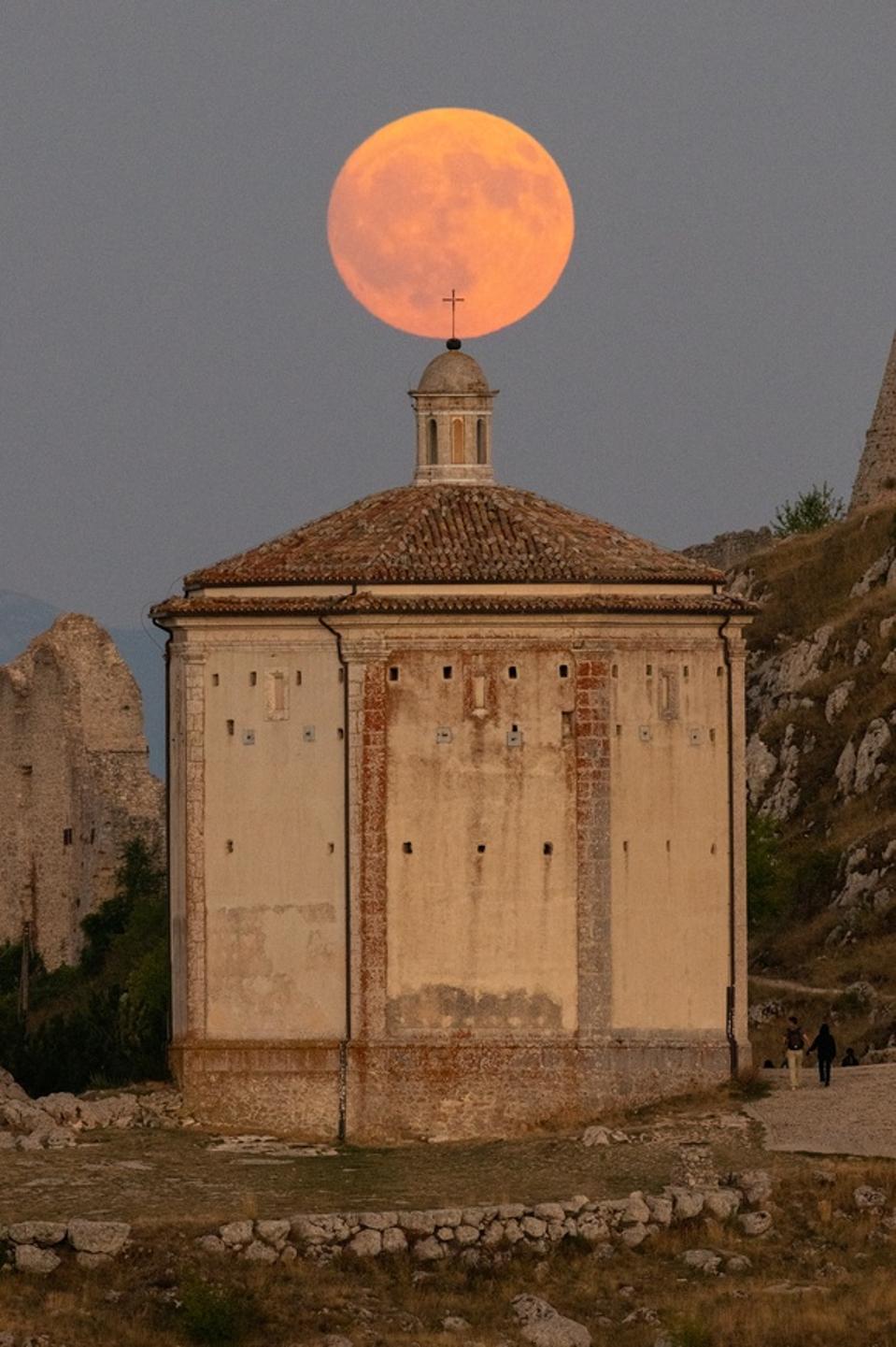 Sturgeon Full Moon Rising Behind Rocca Calascio, Italy