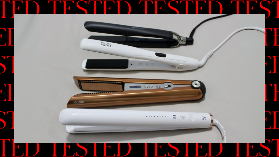 Four hair straighteners on a white countertop