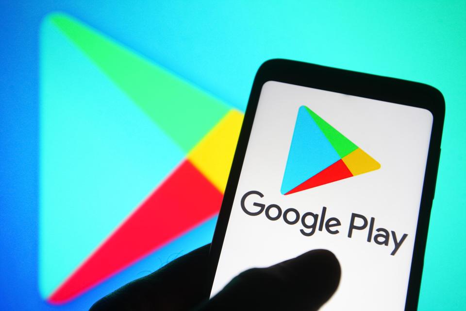 In this photo illustration a Google Play Store logo is seen...