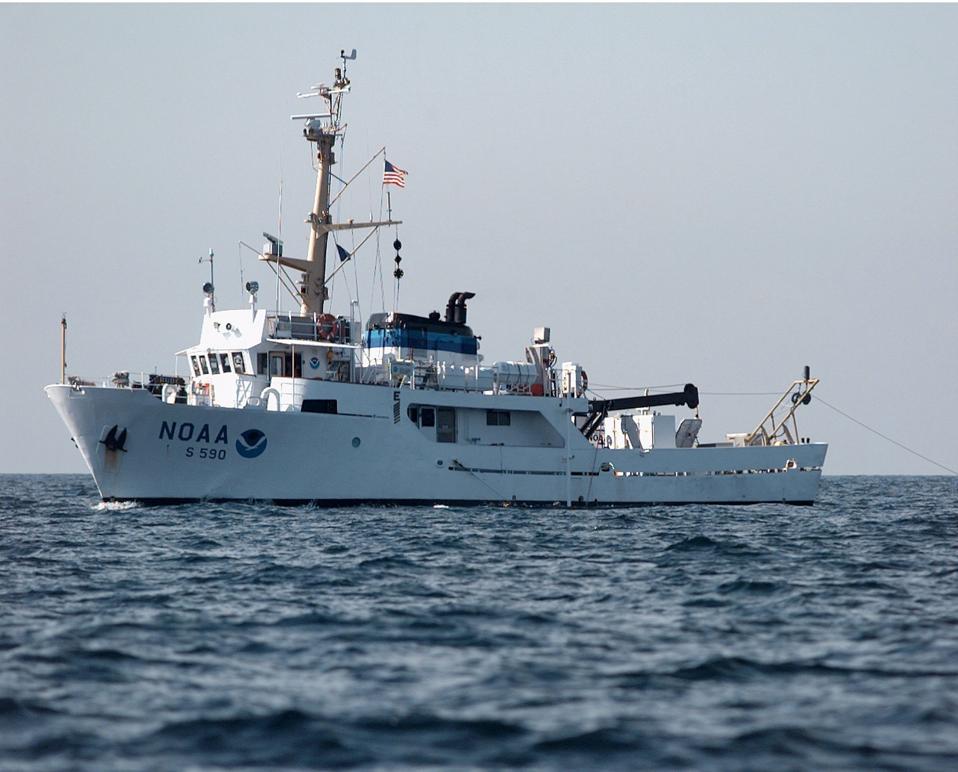 NOAA ship the Rudy drags sonar lines behind the boat as Coas