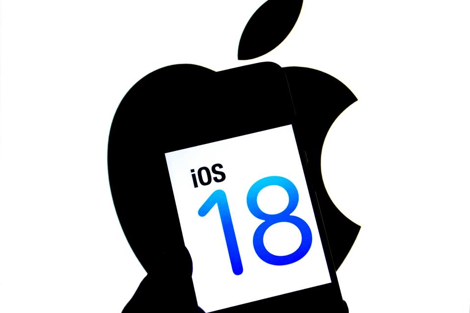 In this photo illustration, an Apple IOS 18 logo seen...
