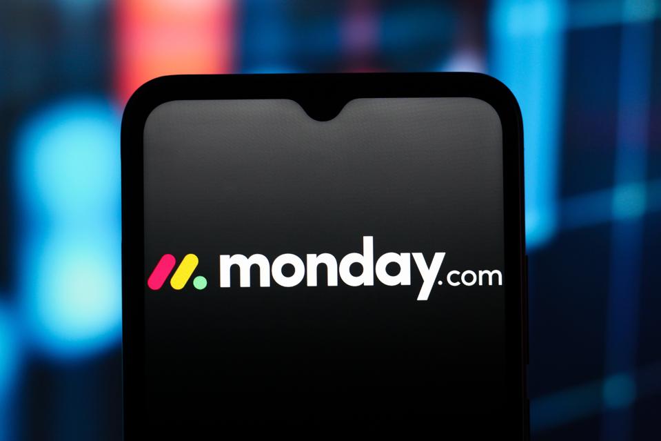 In this photo illustration, the monday.com logo is seen...