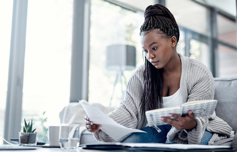 A woman managing her home finances 