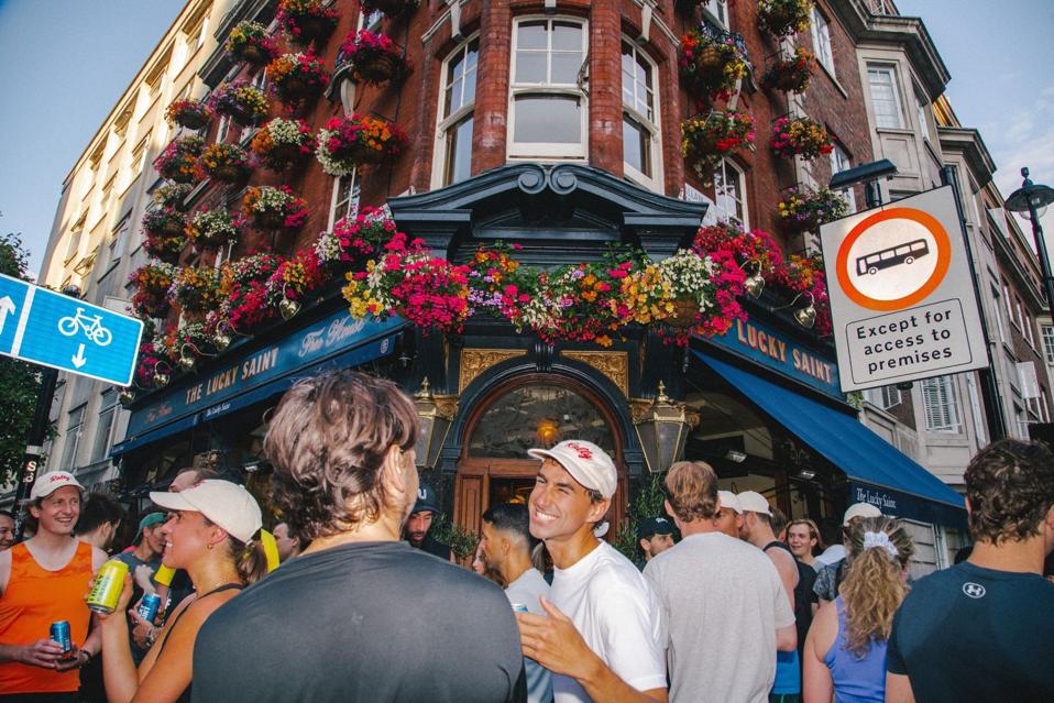 London founders after workout, crowd scene