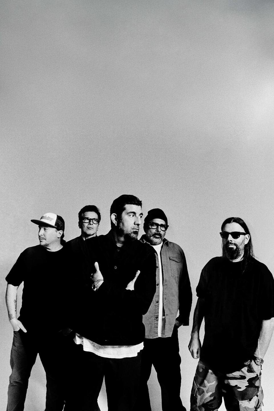 Deftones members left to right: Abe Cunningham (drums), Fred Sablan (bass), Chino Moreno (vocals), Frank Delgado (turntables), and Stephen Carpenter (guitar)