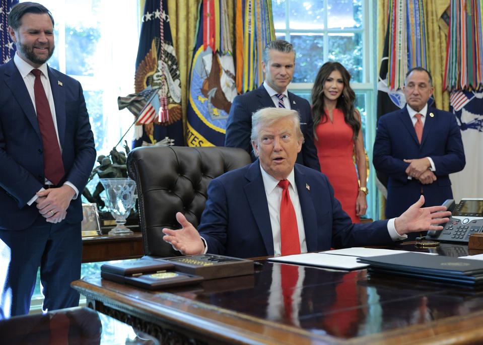 President Trump Signs Executive Orders In The Oval Office Of The White House