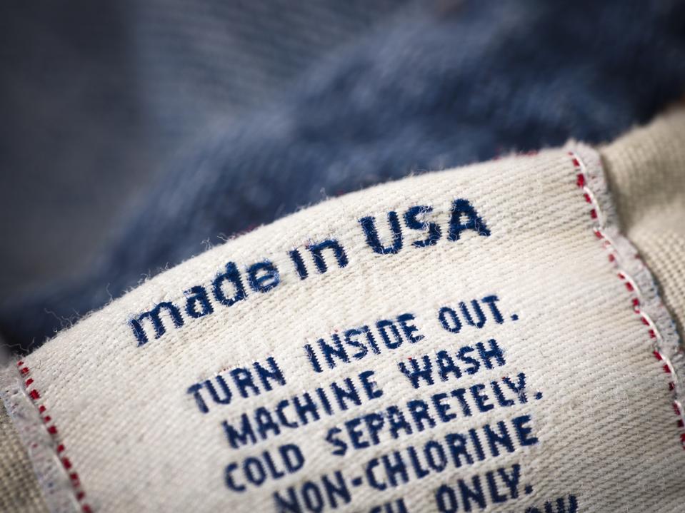Cotton denim jeans tag with "made in USA" prominently displayed.
