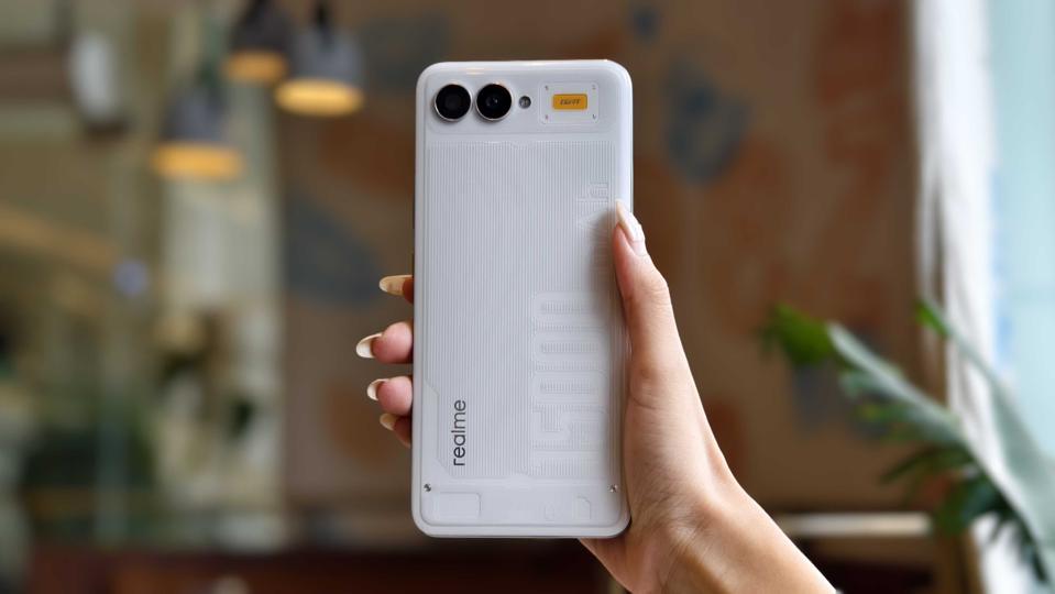 Someone holding the realme 15,000mAh battery concept phone.
