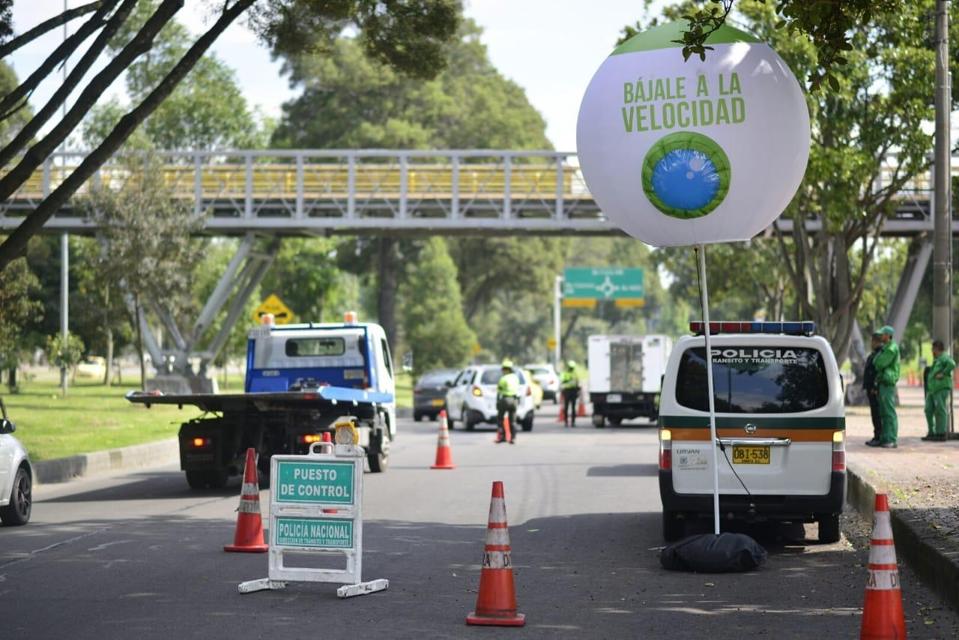 A busy street in Bogotá, Colombia showing speed enforcement.