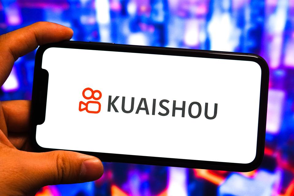 In this photo illustration, a logo of Kuaishou Technology is...