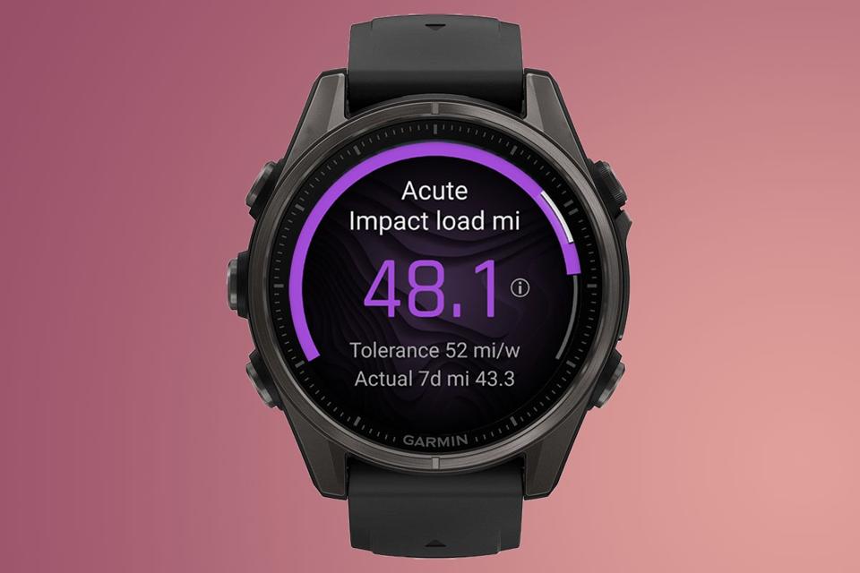 Garmin Fenix 8 watch with Acute Impact load screen.