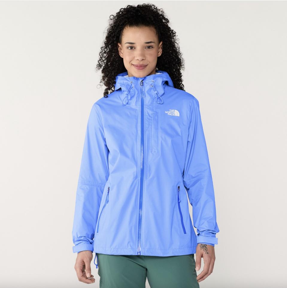Woman wearing The North Face Alta Vista Rain Jacket in Virtual Blue.