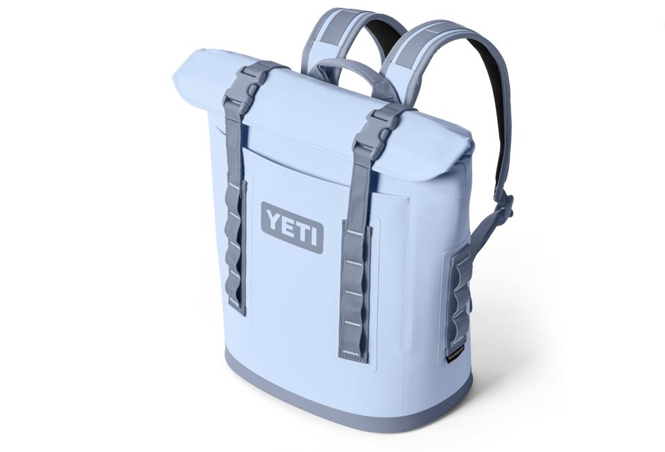 Product shot of Yeti Hopper M12 Backpack Soft Cooler in Big Sky Blue.