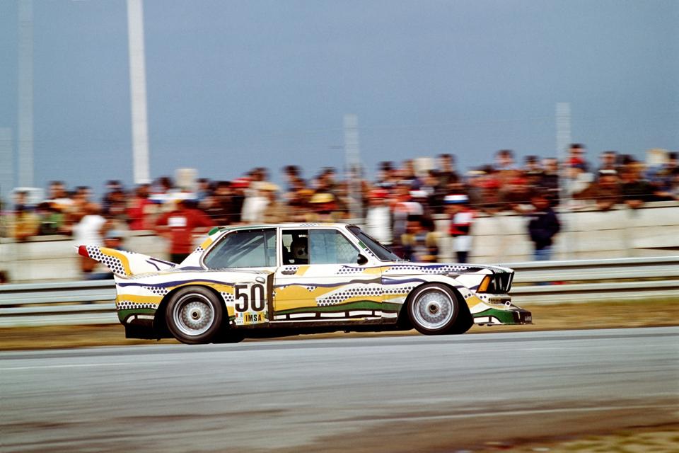 Side profile of BMW 320i Turbo, no. 50, yellow and green and black dotted paintwork