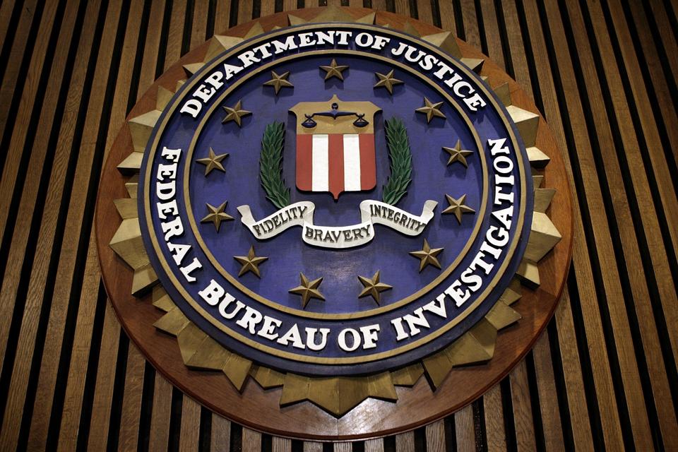 The seal of the F.B.I. hangs in the Flag Room at the bureau's headquaters.