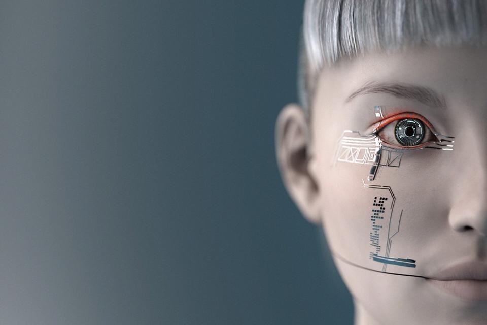A conceptual image of a human face with a cybernetic eye and circuitry patterns, symbolizing brain-computer interfaces and AI reading inner speech.