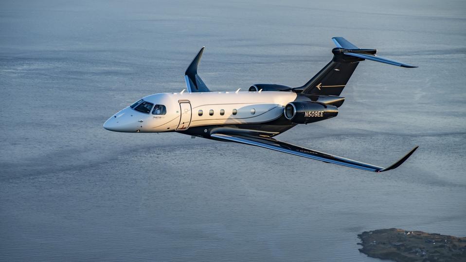 Embraer Praetor 500 executive jet in the air