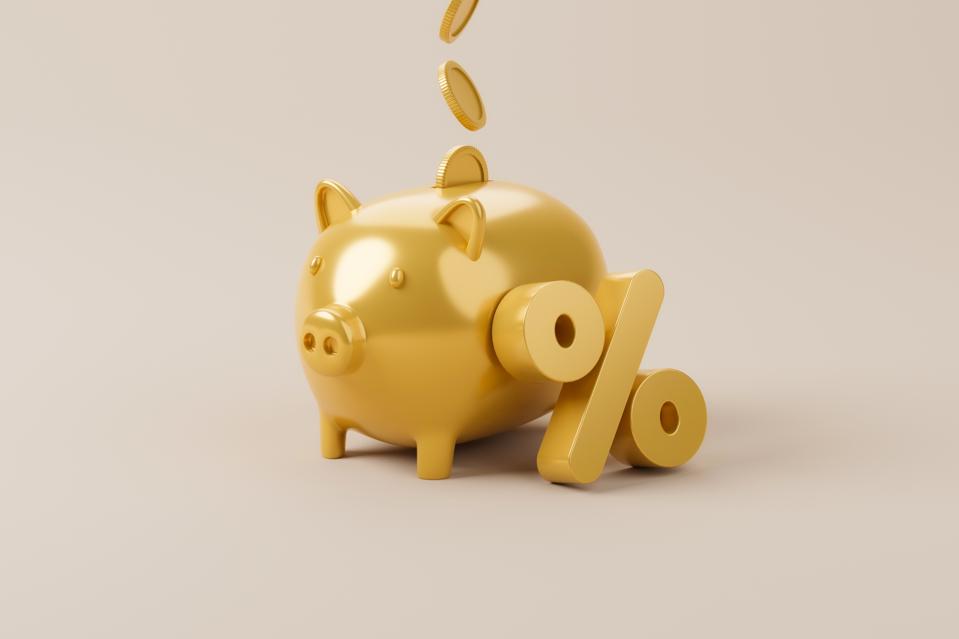 Gold color percentage icon and piggy bank. Save money and investment concept 3d illustration