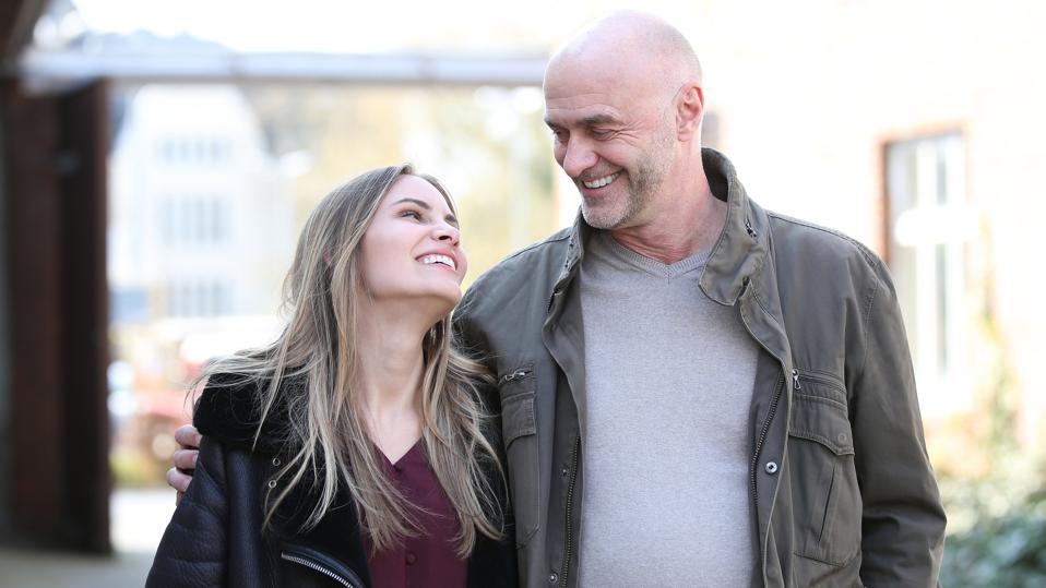 Couple with age difference looks in love