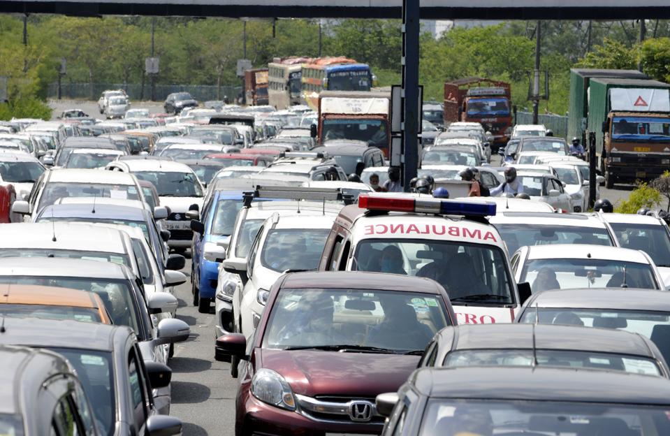 NOIDA, INDIA. Long queue of vehicles seen at Noida border 