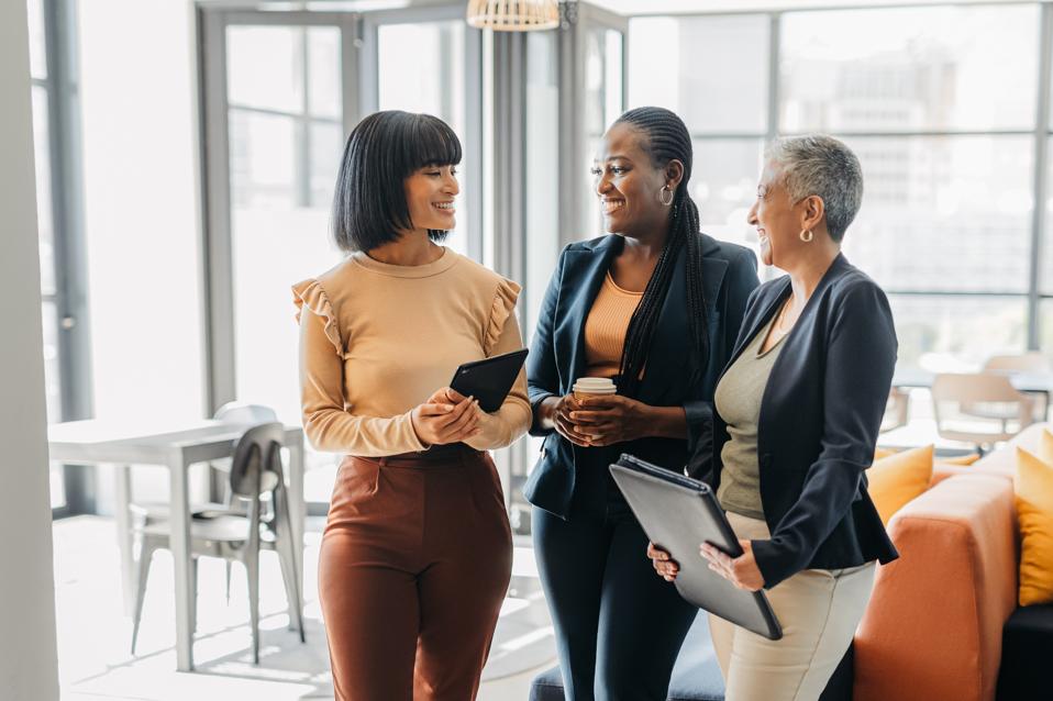 Business women in meeting conversation at digital marketing agency company for empowerment, motivation and tech innovation. 
