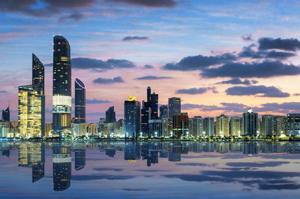 View of Abu Dhabi skyline at sunset