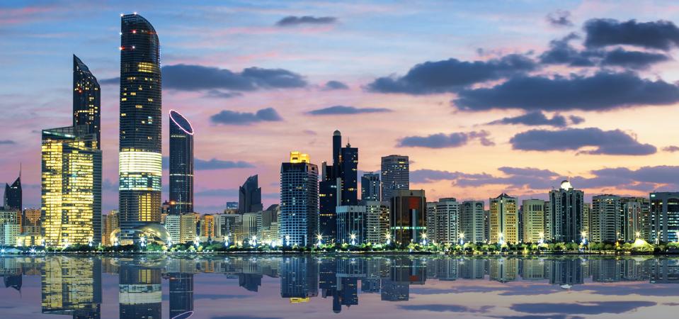 View of Abu Dhabi skyline at sunset