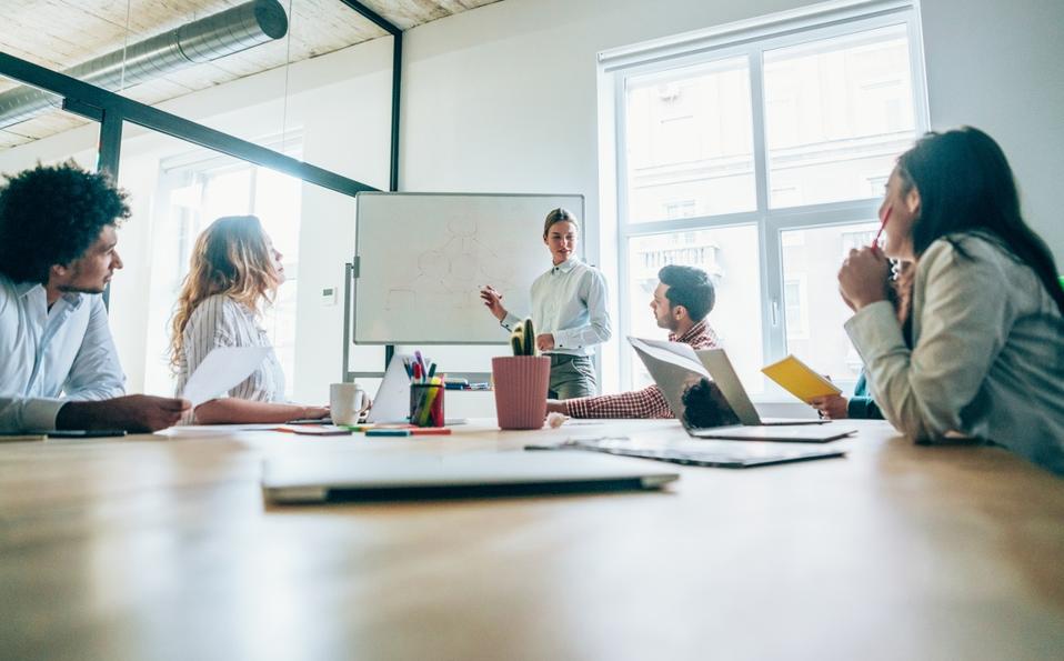 Making plans on whiteboard.