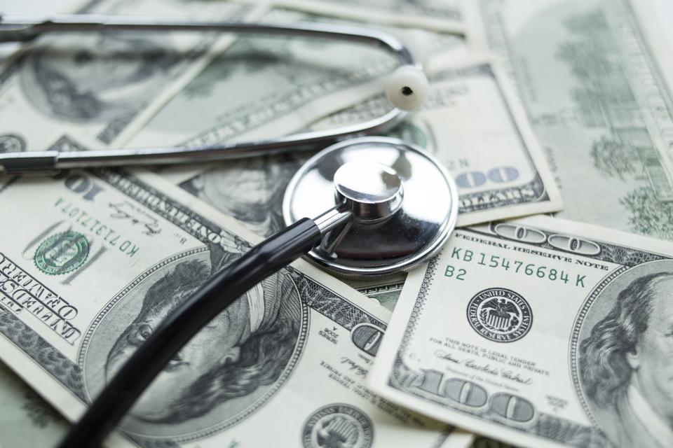 Stethoscope on the dollars.