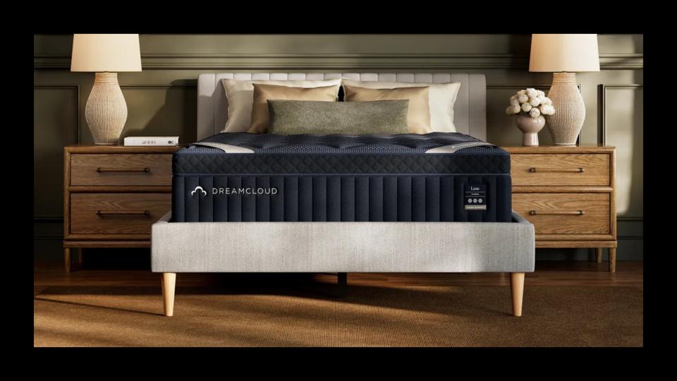 Lifestyle image of the DreamCloud Luxe Hybrid mattress.