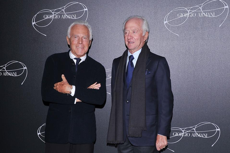 Giorgio Armani (left) and Leonardo Del Vecchio (right) at a Luxottica event in Milan, Italy in February 2023.