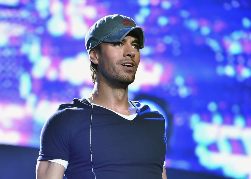 Enricue Iglesias and Pitbull perform in the US Open Night Tour