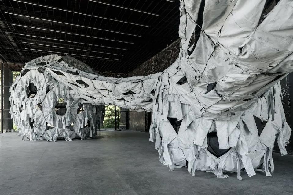 Ai Weiwei Kyiv installation shows giant spheres draped in camouflage fabric painted white