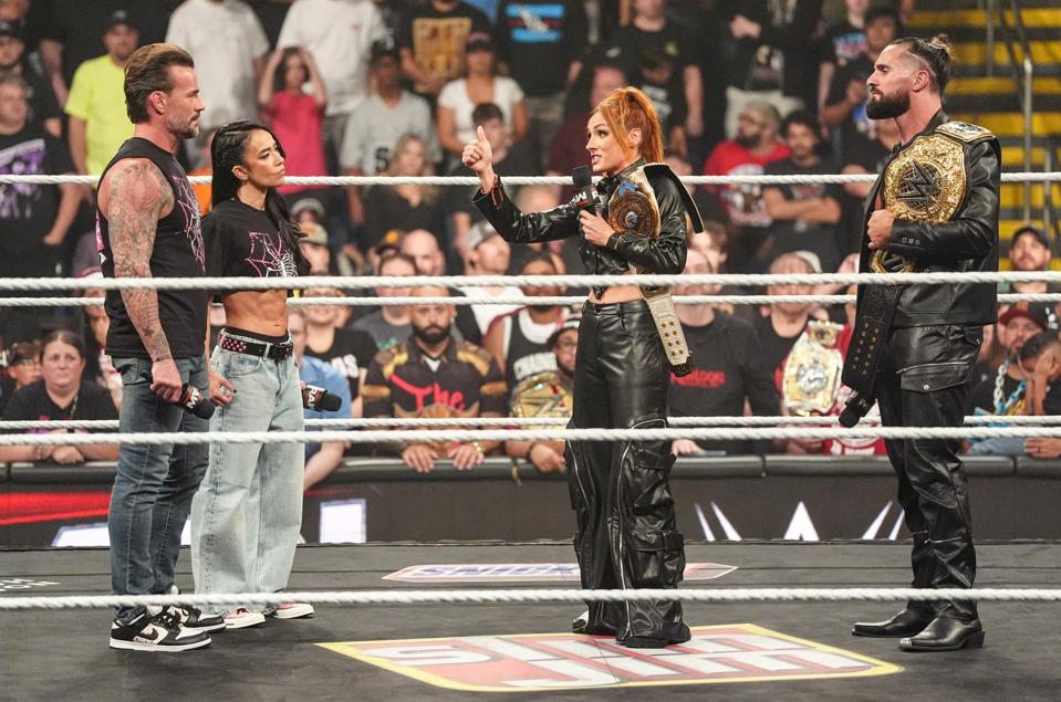 CM Punk and AJ Lee will face Becky Lynch and Seth Rollins.